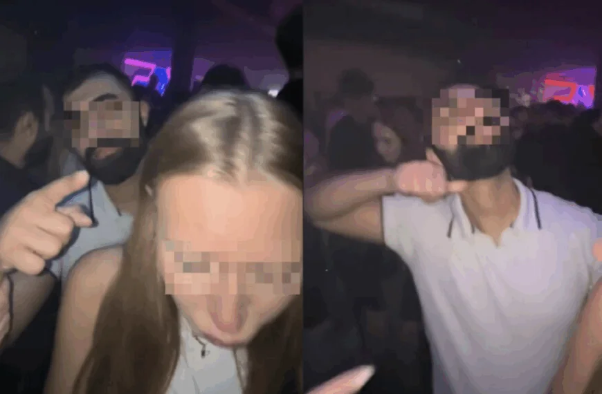 Enorme griezel bedreigt jongedames met de **** in bizarre video in nachtclub